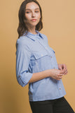 CAMISA ABOTONADA RAYADA BOLSAS