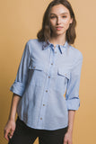 CAMISA ABOTONADA RAYADA BOLSAS