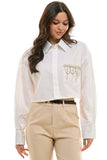 CAMISA ABOTONADA APLICACIONES BOLSA