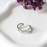 ANILLO RODIO CRUZADO ZIRCONIAS