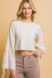 BLUSA TEJIDA CROP MANGA MOÑOS