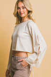 BLUSA TEJIDA CROP MANGA MOÑOS