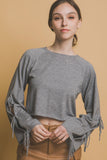 BLUSA TEJIDA CROP MANGA MOÑOS